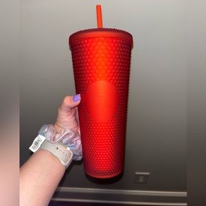 red studded starbucks cup
